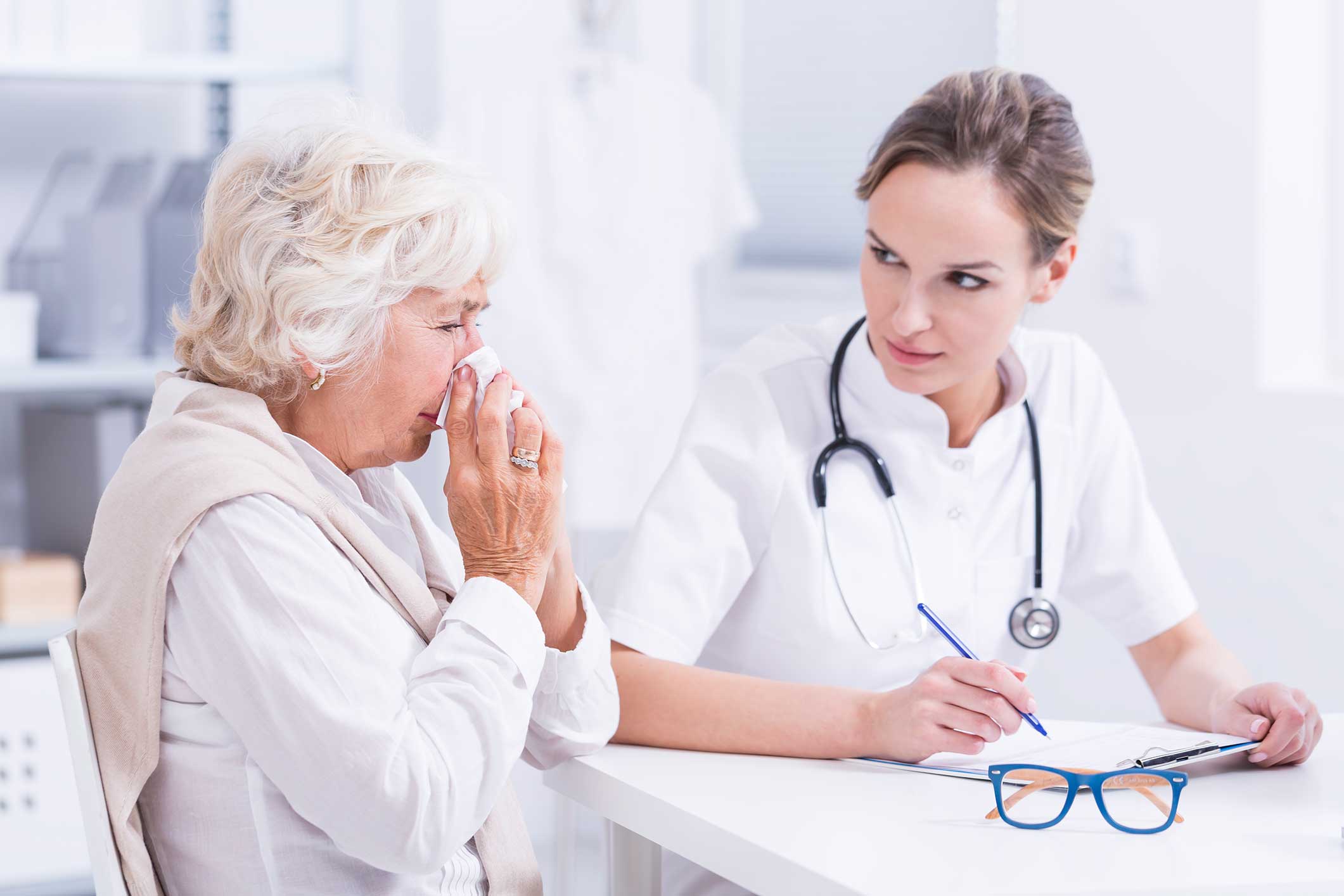 Woman visiting the doctor to get relief from her allergies