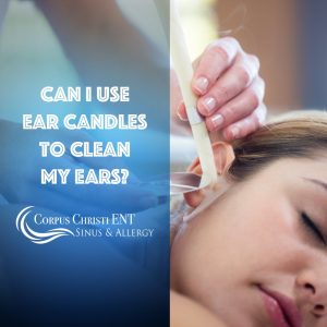 Woman getting hear ears cleaned out with an ear candle